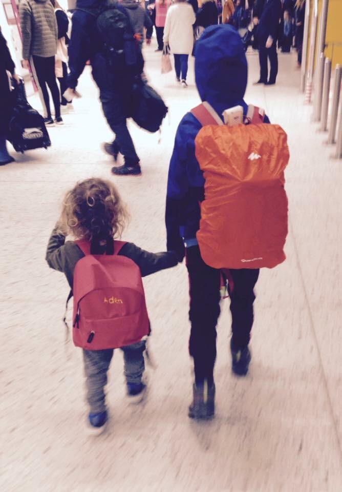 children walking in airport
