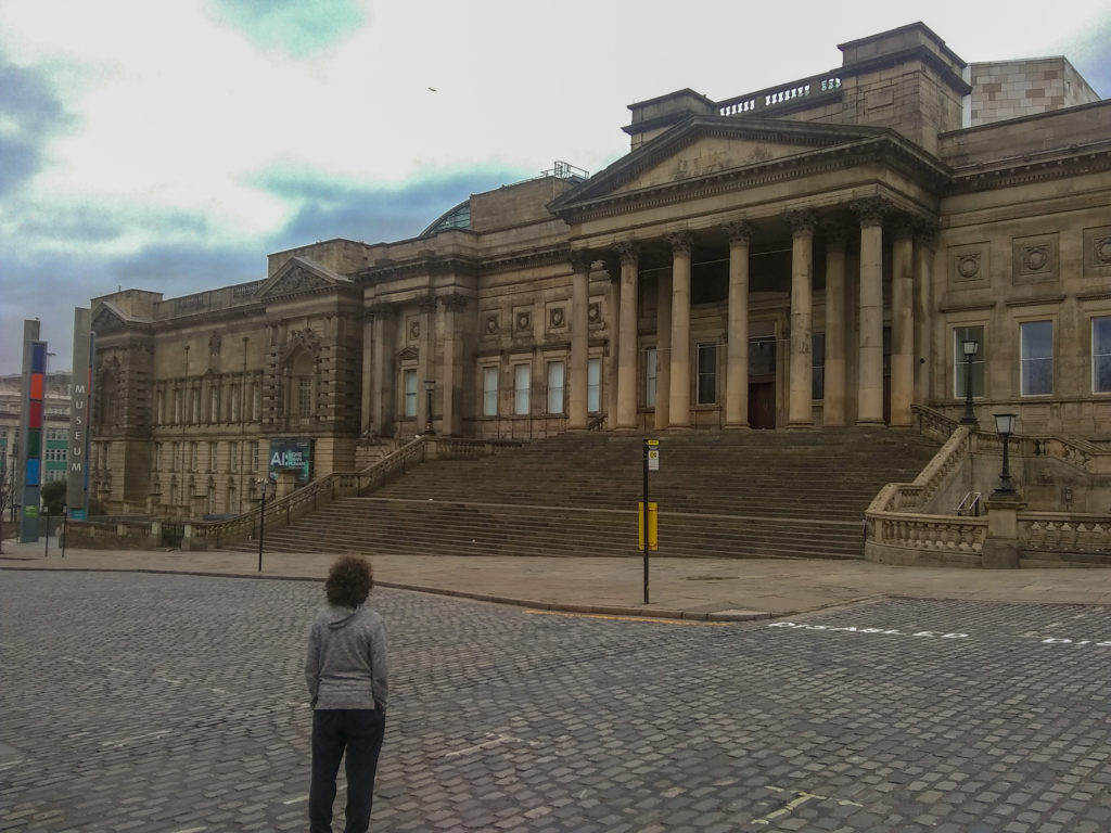 Child in front of Liverpool World Museum and Central Library