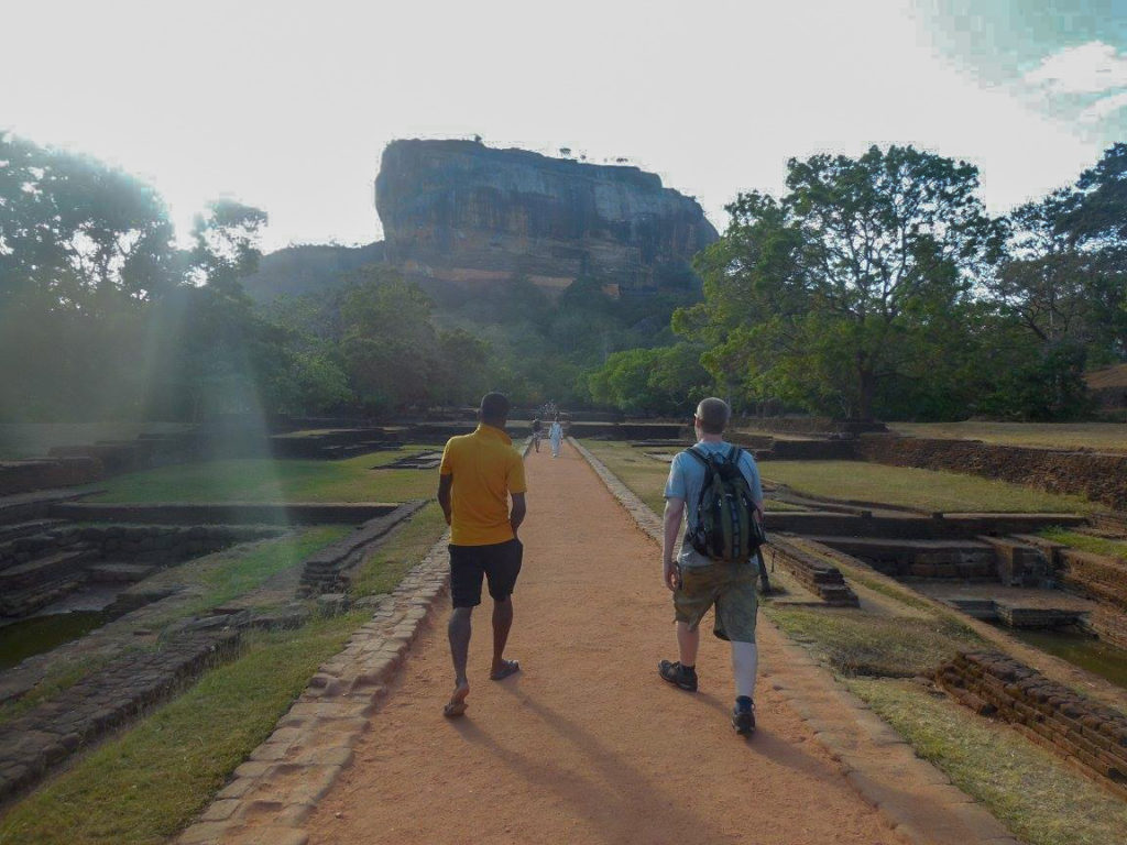 People walking through Royal Bathing Pools at Sigiriya Rock