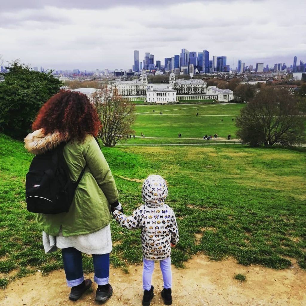 mother and child looking at London from Greenwich