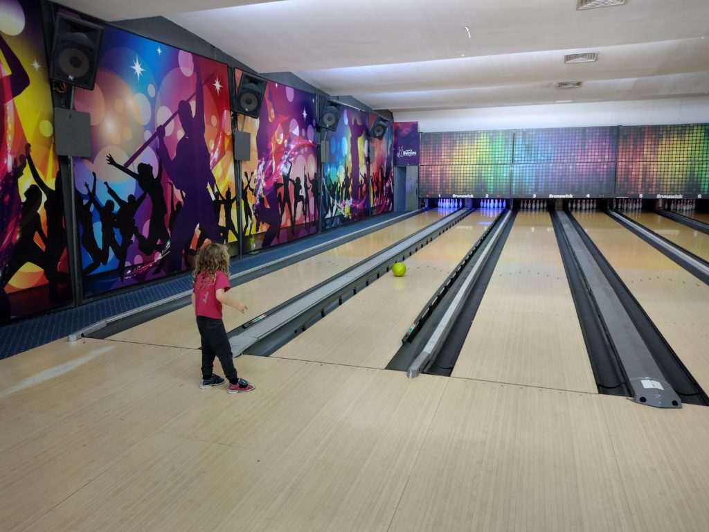 Child playing bowling at Hurghada Bowling Center