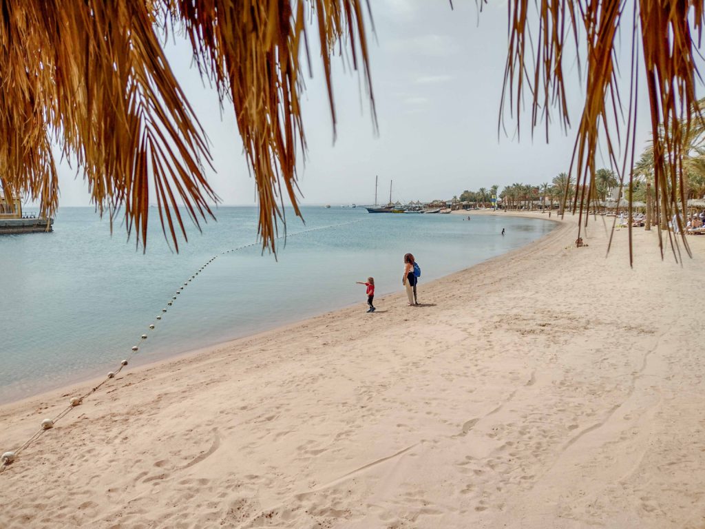 A Family stood on a Beach in Hurghada, Egypt