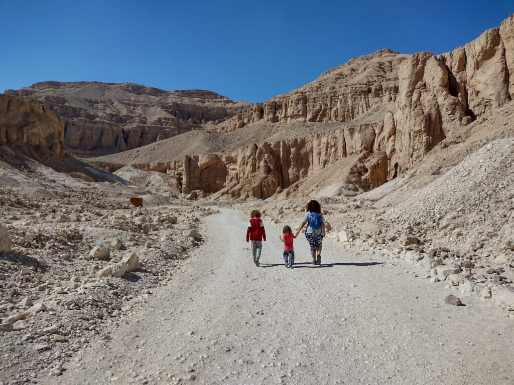 Family walking through valley in Luxor Egypt